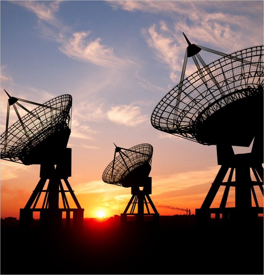 Radio telescopes with sunset in background Radio telescopes with sunset in background